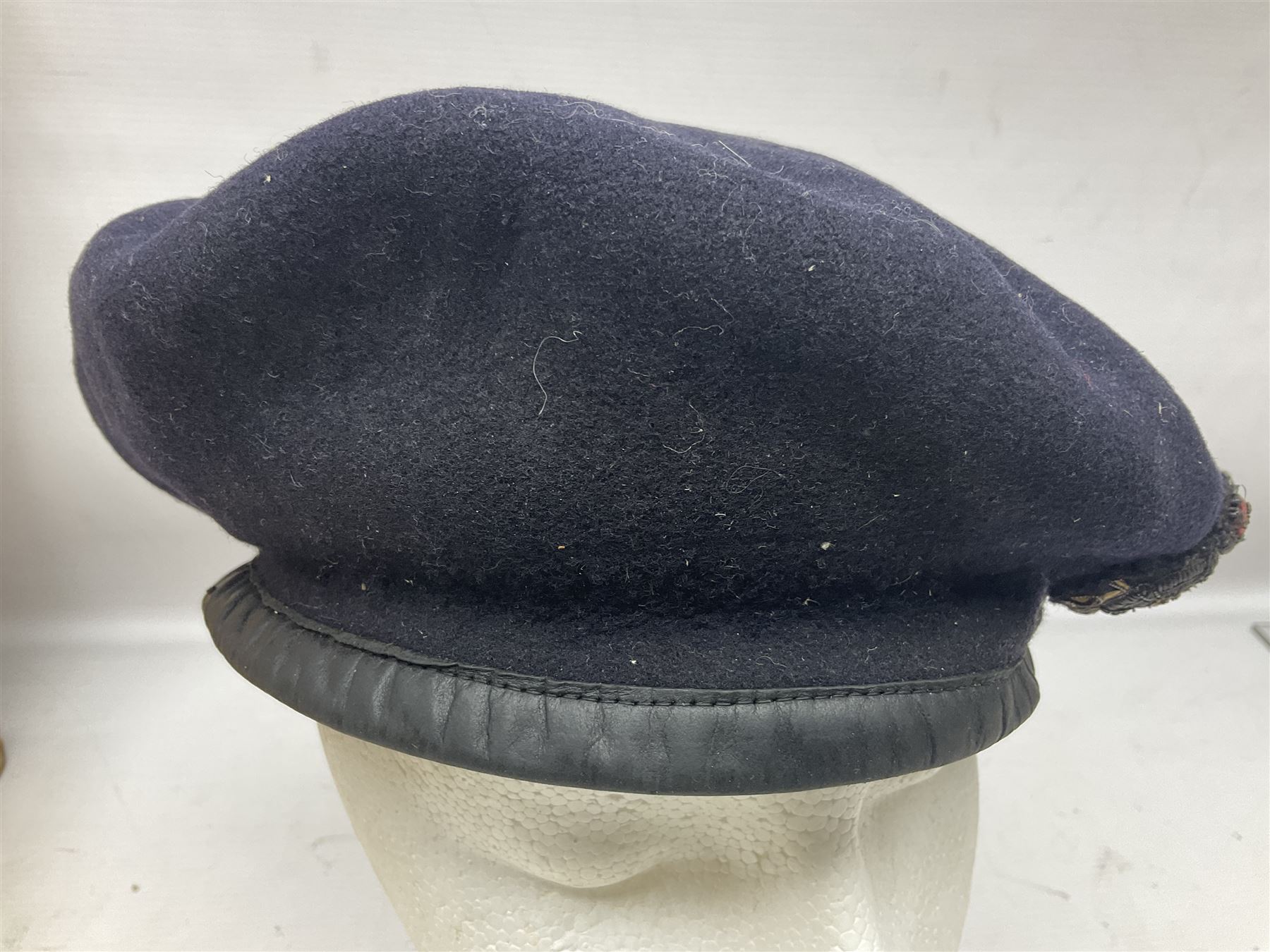 Collection of nineteen British Army booklets 1940s - 1970s including Small Arms Training 1944, various Infantry Training, Cadet Training Manual 1978, Signal Training, Commander's Aide Memoires etc; 1950s blue beret with Yorks Brigade badge; part travelling toilet set in cloth roll; all contained in pine box with webbing straps