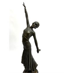 Art Deco style bronze figure of a dancer with arms outstretched, after 'Chiparus', with foundry mark, H40cm overall