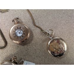 Four early 20th century gold-plated keyless pocket watches, three by Harris Stone Leeds, Waltham and Elgin and two gold-plated watch chains