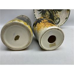 20th century Celtic Pottery, Newlyn, table lamp of tapering form, cylindrical vase and shallow bowl, all decorated with a dark stylised phoenix, modelled with wings outstretched upon sponged ochre, blue and cream ground, bowl D26cm