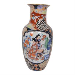 Pair of Japaneses imari vases, the central panel, decorated with figures in a landscape, together with famille rose vase, largest H37cm  