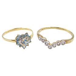 Gold blue topaz and diamond heart shaped ring and a seven stone cubic zirconia ring, both hallmarked 9ct