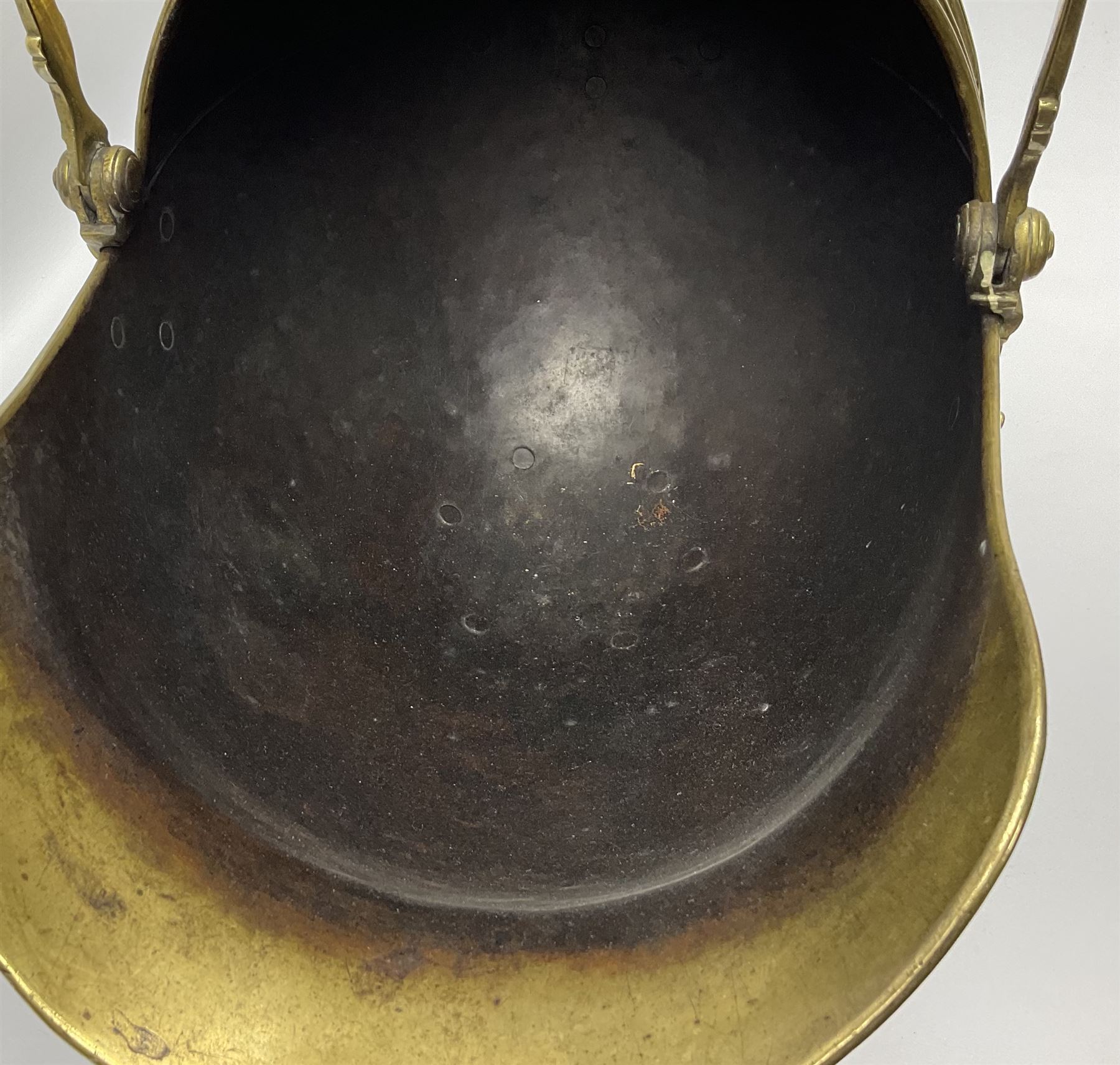 Victorian brass coal scuttle, of helmet form with turned ebonised handles, H48cm