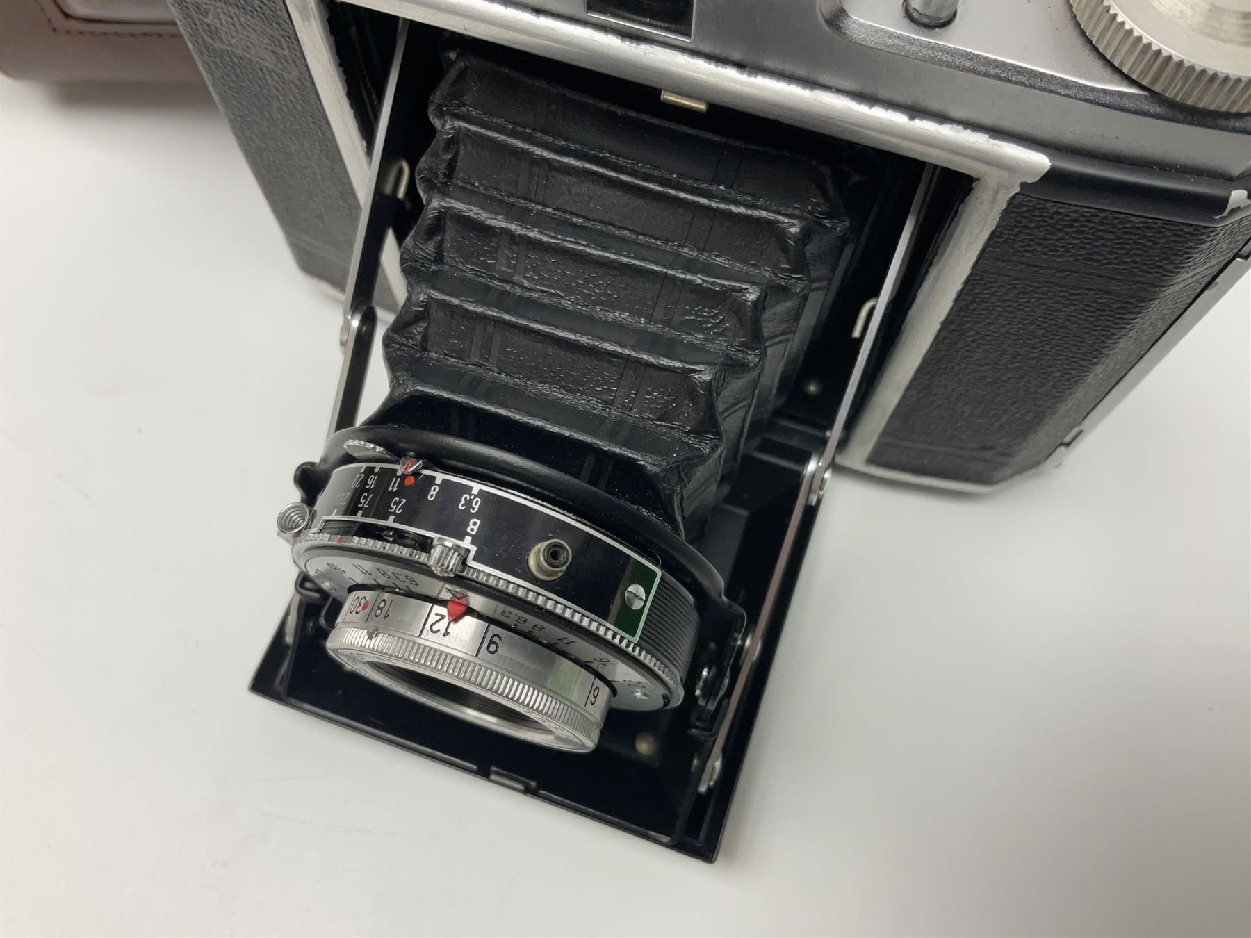 Canon EOS 50e camera body, serial no 8305671 with 'Canon Zoom EF 35-135mm 1:4-5.6' lens together with Halina 35X super camera body, with 'Halina Anastigmat f.c. 1:3.5 f=45mm' lens and other camera equipment 