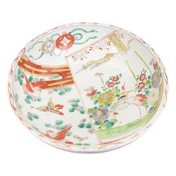 Japaneses imari bowl, decorated to the interior with a crane within a landscape, birds and insects, the external decoration of foliate scrolls, D25cm 