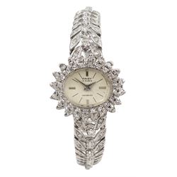 Pagy white gold diamond  ladies manual wind wristwatch, the bezel with two rows of round diamonds and a diamond set bracelet, stamped 18K 750