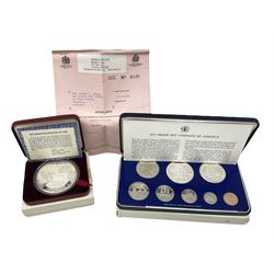 Jamaica 1975 eight coin proof set produced by the Franklin Mint and a Jamaica 1978 sterling silver proof twenty-five dollar coin, both cased with certificates