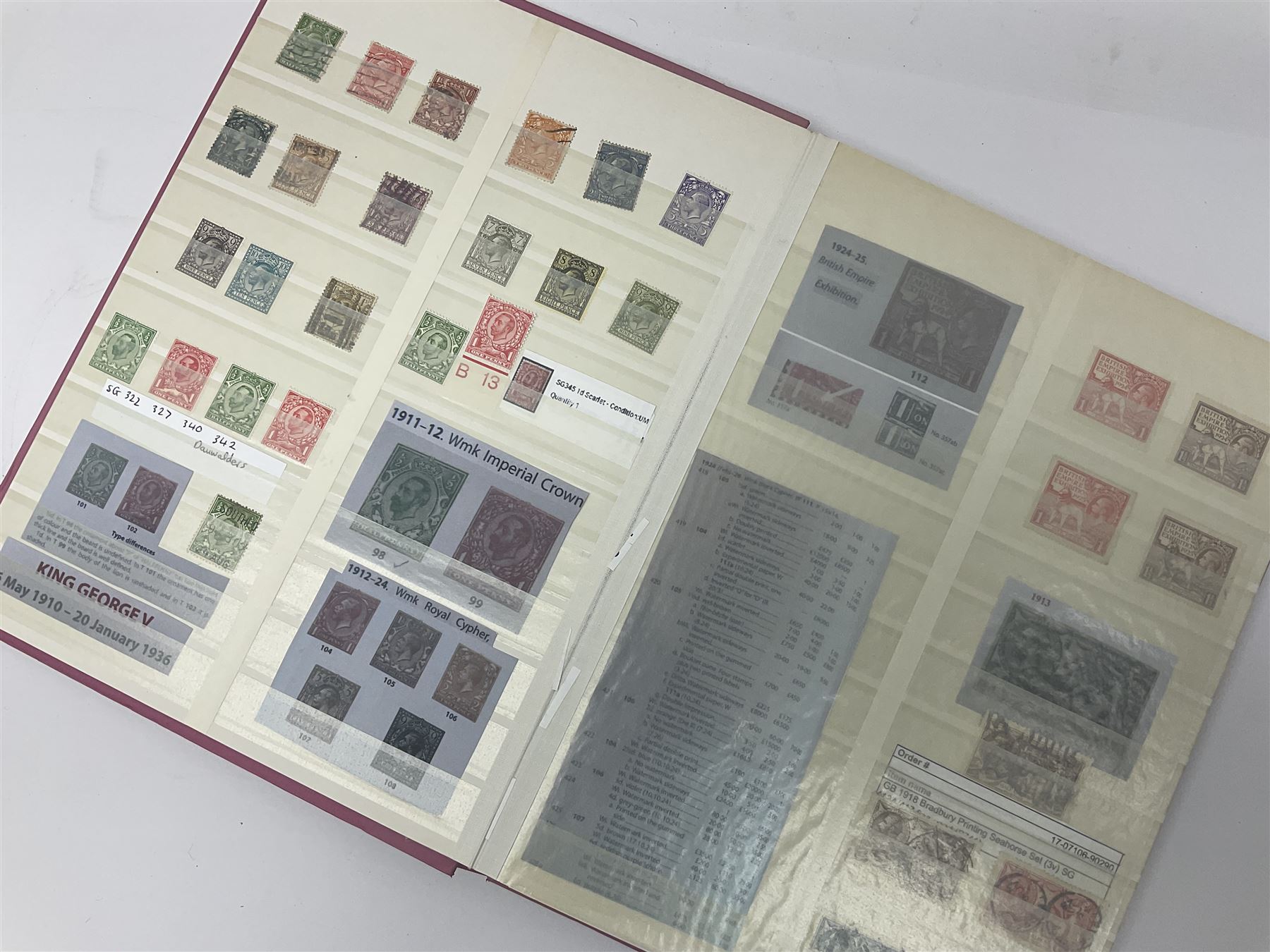 Mostly Great British stamps, including King Edward VII two shillings and sixpence, five shillings and ten shillings, King George V seahorses, King George VI high values, Queen Elizabeth II pre and post decimal etc, housed in a pink stockbook 