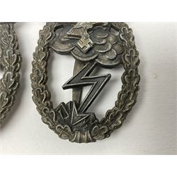 Two WW2 German Luftwaffe Ground Assault/Combat badges - one with flat pin and maker's mark M.u.K.; the other unmarked with round pin (2)