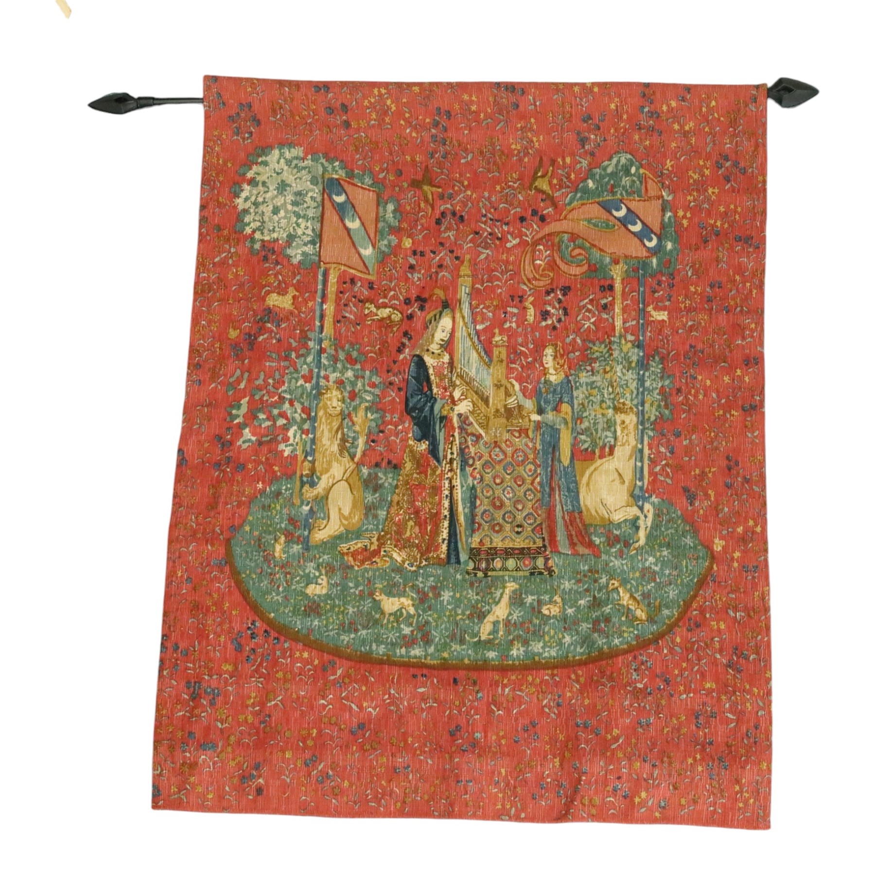 Neo-classical wall hanging, depicting women playing the harp surrounded by animals, on a red ground, with metal pole, L146cm