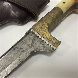 Afghan Khyber knife (Choora), blade engraved along the top edge with ornate brass and bone grip, with leather scabbard, overall L31cm, blade L20cm