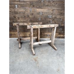 Pair of late 19th century pitch pine trestles, square tapering form in stripped finish