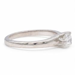 Platinum single stone diamond crossover ring, single round brilliant cut diamond of 0.50 carat, hallmarked