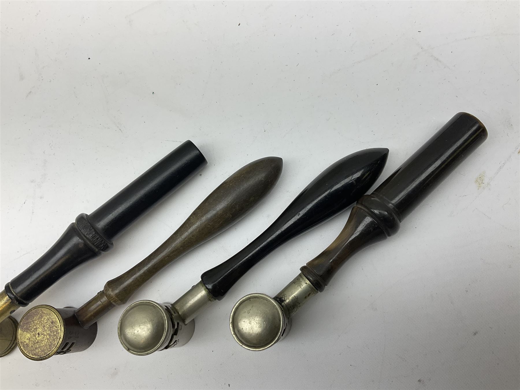 Riling Ray: The Powder Flask Book. 1992 R&R Books facsimile edition of the 1953 original; four powder measures including two by G. & J.W. Hawksley with horn handles; 16-bore combined spent cartridge and broken case remover; and turnscrew screw-driver (7)