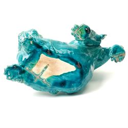 Early 19th century Chinese Tek Sing cargo saucer dish with Nagel Auctions label D18.5cm Chinese, Kangxi blue and white square section vase H24cm and a turquoise glazed Dog of Fo L26cm (3)