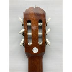 Spanish BM acoustic guitar with mahogany back and sides and spruce top L101cm; in cello carrying case; Roland foot pedal and two Yamaha foot pedals; tin D# organ pipe; folding music stand etc