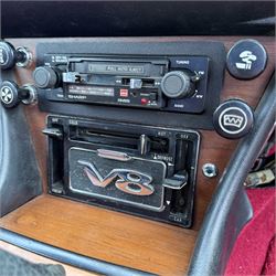 1973 Triumph Stag Mk II 3.0 V8 Manual with Overdrive

Registration: FTV 859L
Date of first registration: 8th March 1973
Recorded mileage: approximately 50,000 miles
Engine: 2,997cc petrol V8
Transmission: four-speed manual with overdrive

An attractive manual-overdrive example of Triumph’s celebrated V8 grand tourer, finished in yellow and supplied with both a removable hardtop and folding soft top.

The car has been the subject of extensive restoration and mechanical work, supported by a large history file containing invoices, notes and photographs documenting the work undertaken. The accompanying records indicate that the engine was rebuilt at approximately 36,000 miles, including re-boring of the block, checking and machining of the top faces, and steam cleaning following machining.

Further work and replacement parts are understood to include an upgraded radiator, electric cooling fan, Stag Webber header tank kit, complete set of cooling hoses and clips, fuel pump and filters, alternator, distributor cap, HT leads, spark plugs, front brake calipers and hoses, rear brake cylinders, tyres, front lights and LED bulbs. Various seals, interior trim items and seat components have also reportedly been renewed.

The car is believed to have been dry-stored from 1994 until 2017, with a substantial programme of recommissioning and improvement subsequently undertaken between 2017 and 2023. The history file also includes earlier MOT certificates dating from 1988 to 1994.

Offered with its V5C, hardtop, soft top, extensive restoration and maintenance history, photographic record and a quantity of useful spare parts, including a new dashboard veneer set.