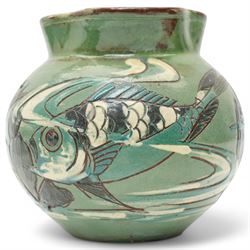 Late 19th century C H Brannam pottery Barum ware sgraffito jug, in green and brown glaze, decorated with fish swimming amongst reeds, signed and dated 1892 to base, H10cm 
