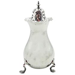 Edwardian silver sugar caster, of plain bellied form with 'frilled' rim, and removable pierced cover, upon three pad feet, hallmarked Pearce & Son, Chester 1909, H14.5cm, approximate weight 6.07 ozt (189 grams)
