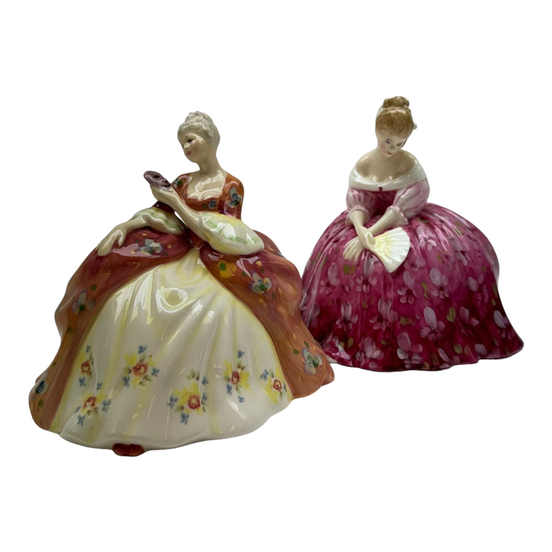 Two Royal Doulton figures, Victoria HN2471 and Wistful HN2396, together with three Royal Worcester figures Sappier, Amber and Claudia 
