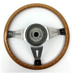 A mahogany three spoke rally steering wheel, marked Formula GT Britain, D33.5cm. 
