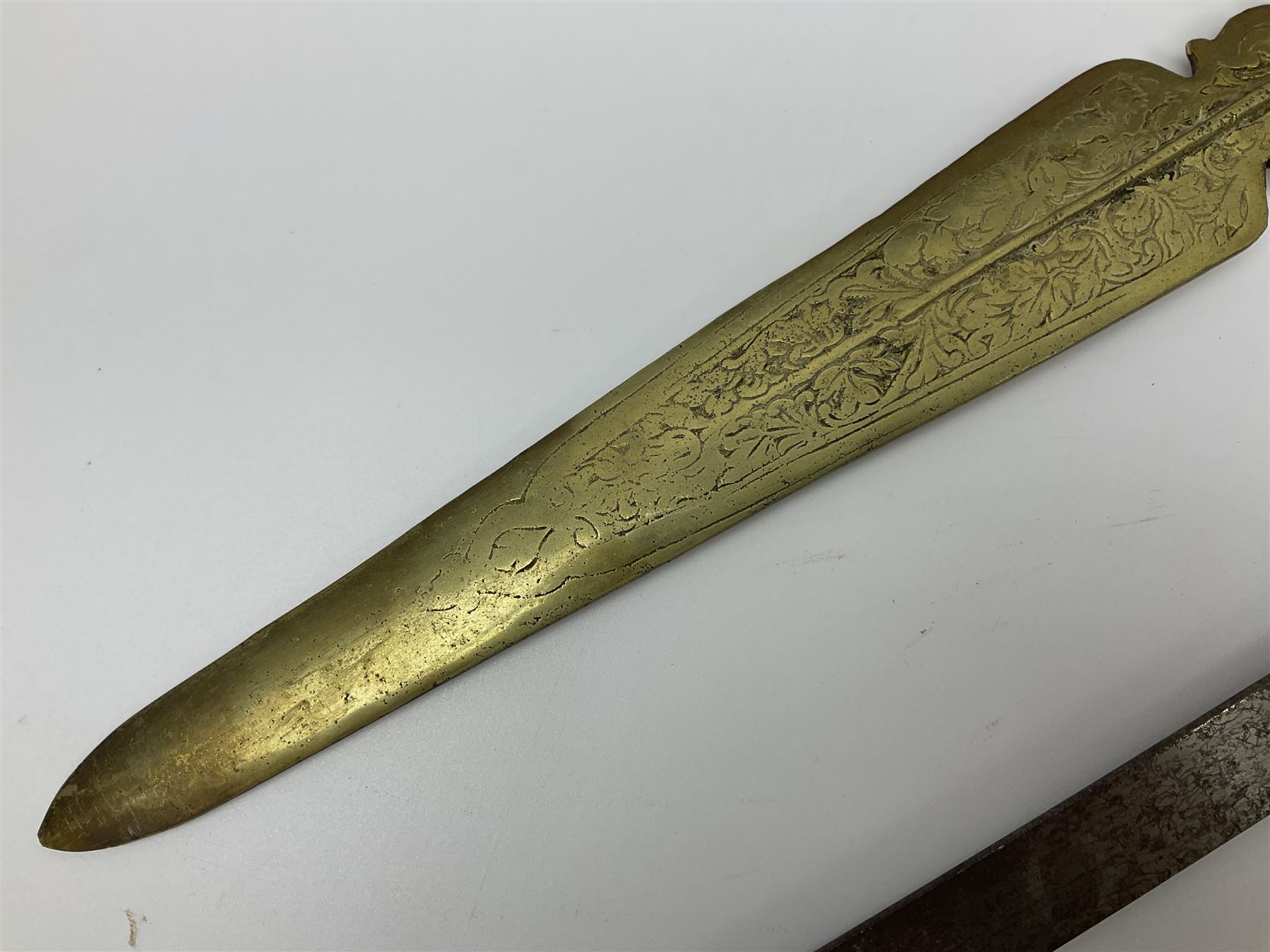 Near pair of short swords each with slightly curving 41cm fullered steel blade and all brass H-shaped hilt L52cm overall; plaited black leather whip; and reproduction pair of brass hilted swords, brass halberd blade and mace (7)