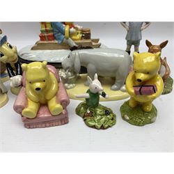 Nine Royal Doulton Winnie the Pooh Collection figures, including Oh Dear Bath Time's Here, Going Sledging, Tigger's Splash Time and Christopher Robin, together with a Royal Doulton Disney Showcase Jiminy Cricket figure, all boxed