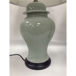 Pair of table lamps of baluster form, with a crackle glaze over a pale blue ground, including shade H68cm