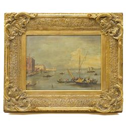 Follower of Francesco Guardi (Italian 1712-1793): Venice - the Fondamenta Nuove with the Lagoon and Island of San Michele, 19th century oil on panel unsigned 29cm x 39cm, in 19th century giltwood and gesso ornately moulded frame, overall 52cm x 62cm