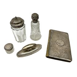 Edwardian silver mounted purse, with circular panel engraved with initials, and hammered finish, hallmarked William Comyns & Sons, London 1903, H14cm, together with three dressing table glass jars with hallmarked silver covers, and a hallmarked silver mounted buffer 