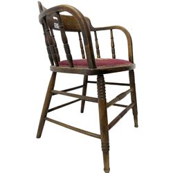Early 20th century American oak smokers bow tub armchair, shaped cresting rail with pierced handle over ring turned spindle back, seat upholstered in pink tapestry fabric (W56cm, H73cm); small 20th century walnut occasional table on turned supports (W43cm, H70cm, D33cm)