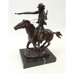  Patinated bronze study of a Cowboy with a pistol & shotgun on a galloping horse after Karl Kauba, on rectangular marble base, inscribed Kauba, H29cm overall  