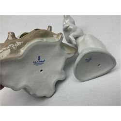 Four Lladro rabbit figures, comprising, Hippity Hop no 5886, Sitting Bunny no 5907, Washing up no 5887, and Rabbit Eating no 4773, largest example 14cm  