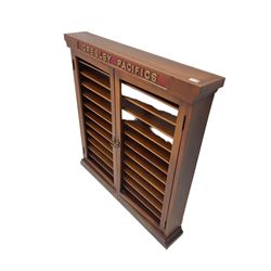 Modern hardwood display cabinet for model railway locomotives inscribed 'Gresley Pacifics' to the frieze and 'LNER' to the bottom rail; with mirrored back and ten loose fitting shelves enclosed by a pair of unglazed doors L101cm H108cm D16cm