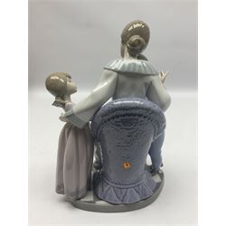 Lladro figure, Mothers Day, modelled as a mother with her two children, sculpted by Francisco Catalá, with original box, no 5596, year issued 1989, year retired 1998, H24cm