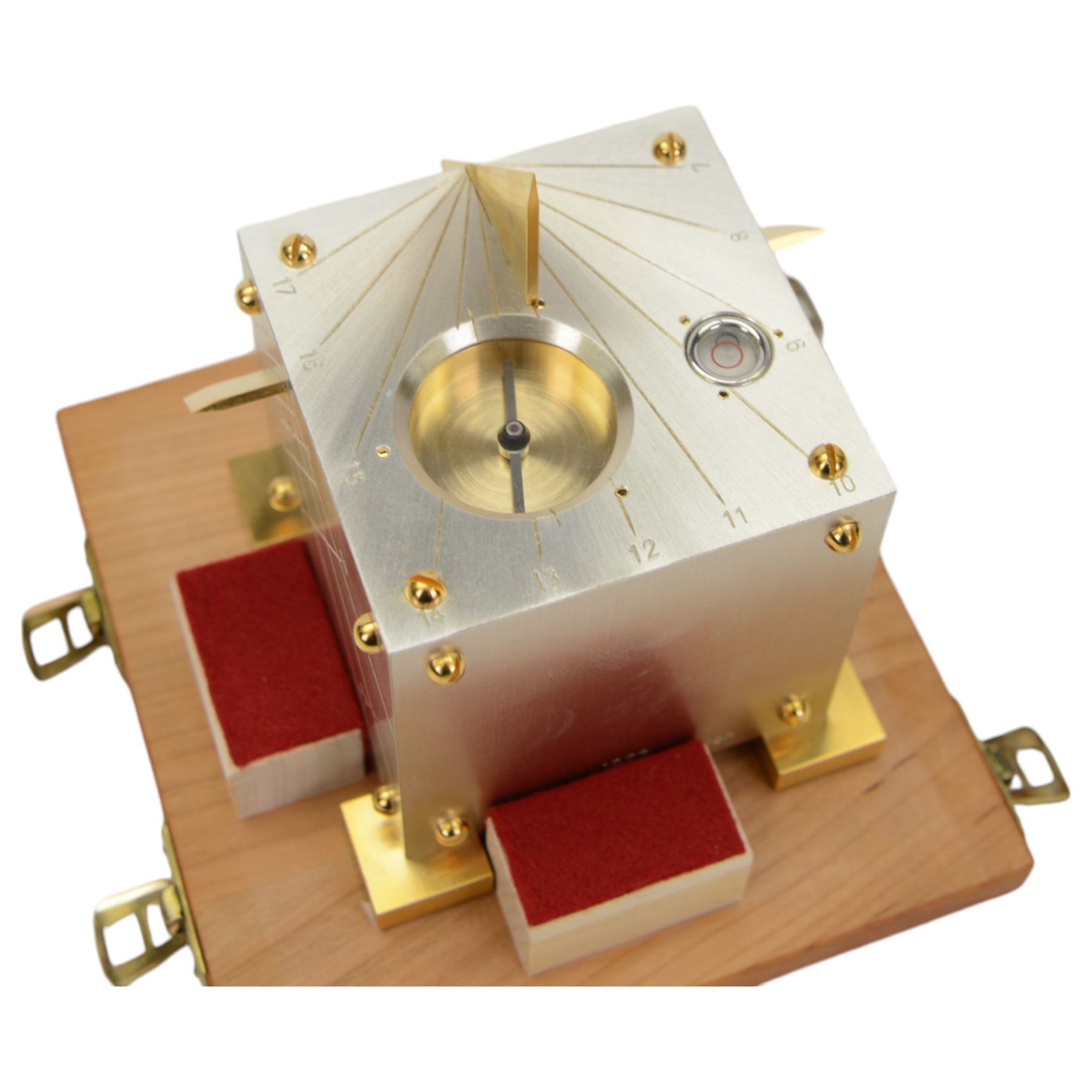 1990s Swiss silver and gold plated cube sundial, the top face of the cube with inset compass and gold plated gnomon, engraved to four sides with degrees of latitude, engraved to lower portion of one side 1993 Walther Signer Zurich, 925, contained within a fitted wooden box