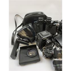 Vintage cameras lenses and accessories including Olympus 'OM10' camera body, Olympus 'OM4' camera, 'Olympus OM-System Zuiko auto-zoom 35-70mm 1:4' lens, various other lenses, tasco binoculars etc, in one box