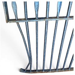 Two sections of painted iron garden or estate boundary railing, comprising a 19th century wrought iron section with graduated spearhead uprights, together with a later hoop-top section with ball-finial end posts, both in blue painted finish