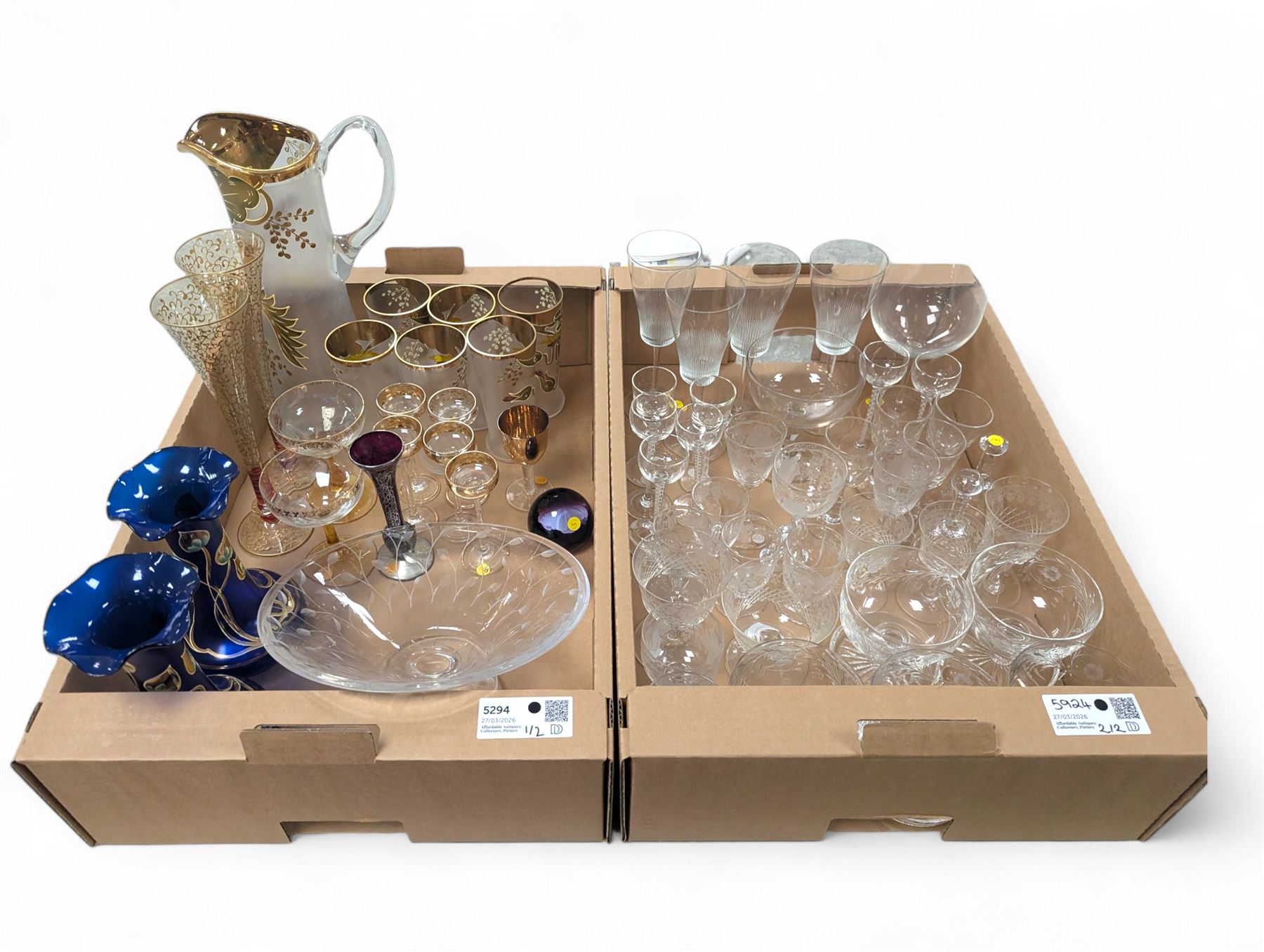 Collection of assorted glassware, to include Czech hand painted lemonade set, with tall jug and six glasses, pair of Art Nouveau blue glass vases painted in gilt with foliate tendrils, John Walsh style bowl with cut leaves decoration, various Edwardian drinking glasses with cut and etched decoration, etc., in two boxes