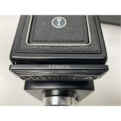 Yashica-A camera body, serial no. A4080073, with 'Yashikor 1:3.5 f=80mm' lens, serial no. 209272 and 'Yashikor 1:3.5f=80mm' lens, serial no 22942, together with Yashica TL-Electro camera body, serial no. 5054162 with 'Yashinon-DS 50mm 1:1.9  40056038