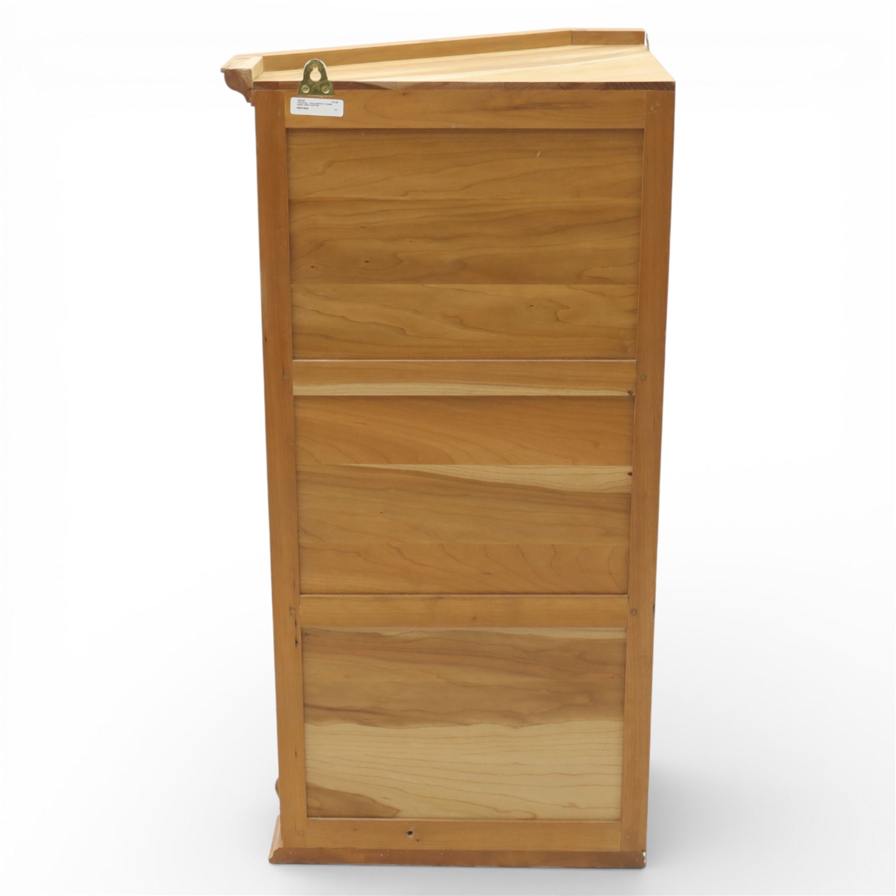 Unicornman - glazed oak corner cabinet, the triangular top with moulded cornice above a bevelled glass door, enclosing two fixed shelves, the canted front corner carved with Unicorn motif, by Geoff Gell of Coxwold