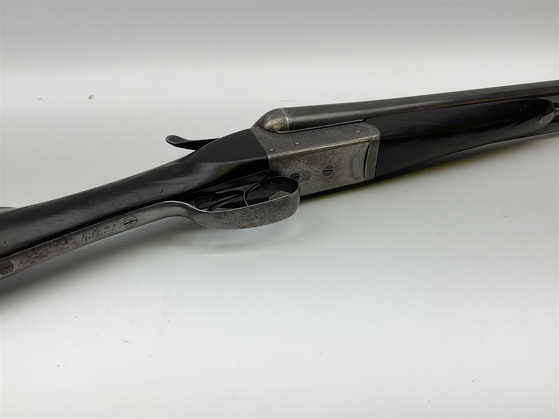 Charles Boswell 12-bore side-by-side double barrel box-lock non-ejector sporting gun, with 71.5cm sleeved barrels, thumb safety, walnut stock with chequered grip and fore-end, serial no.12720, L112.5cm overall SHOTGUN CERTIFICATE REQUIRED