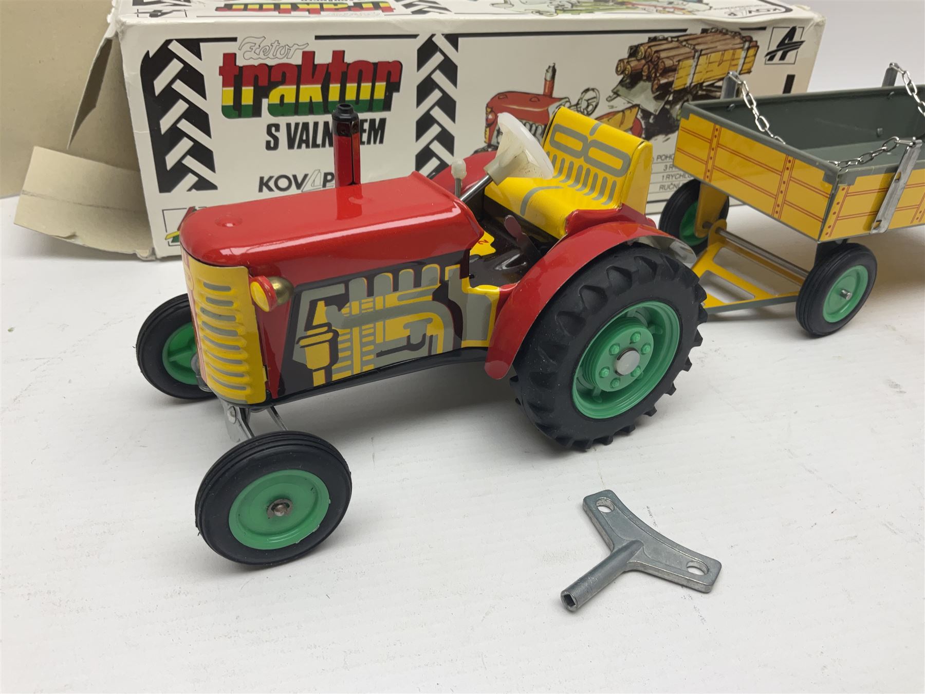 Kovap - eleven tinplate models to include Tractor and Trailer, Road Roller 1927, Moving Moneybox 1924, Hawkeye type B 1924, Boy on a Tricycle; all in original boxes 
