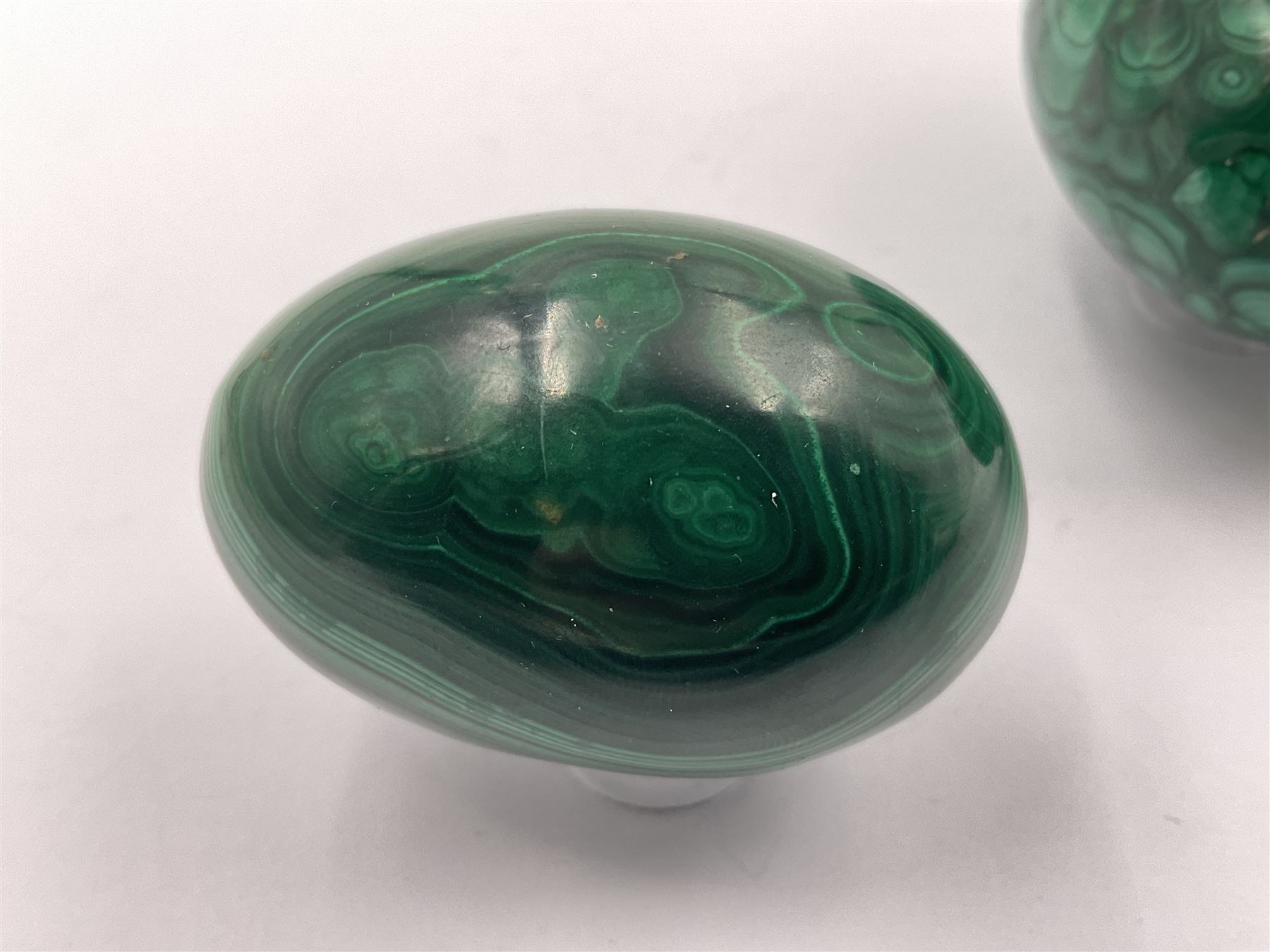 Three malicate specimen eggs, originally part of the collection of the late Stanley J Seeger, largest H7cm