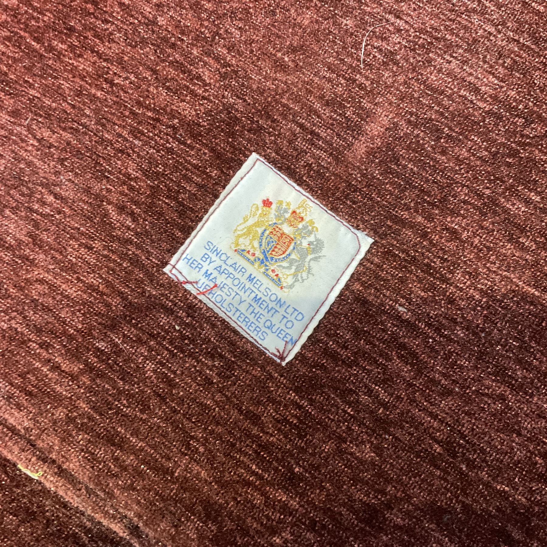 Knole type drop arm sofa with cushions in a traditional patterned upholstery,