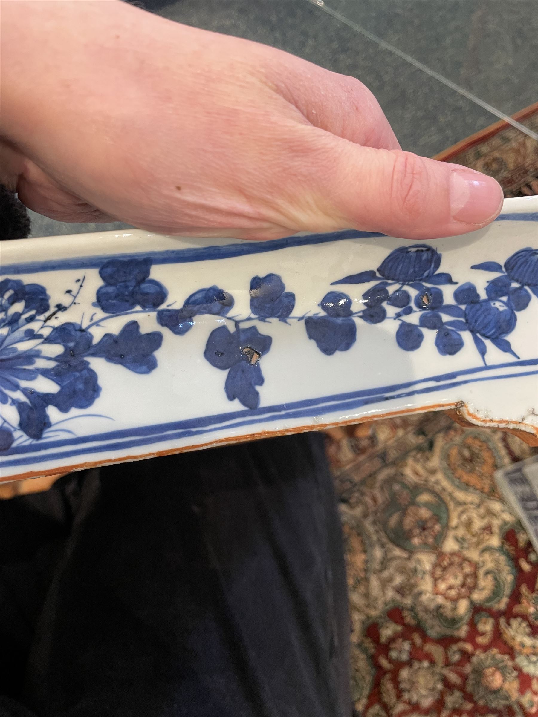 Chinese blue and white planter and stand, each of square slightly tapering and flared form, the planter decorated with two dragons and blossoming peonies, between stylised borders, the stand decorated with flower heads and vines, planter H30cm W29cm, stand H7cm D28.5cm