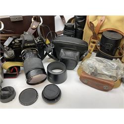 Cameras, lenses and camera equipment, to include, Asahi Pentax Spotmatic camera body fitted with Asahi Opt Super-Takumar '1.2/55' lens, Pentax K-m camera body fitted with SMC Pentax-Dal '1:3.5-5.6 18-55mm' lense, Canon F1 camera body fitted with Tamron SP Tele Macro BBAR MC '28-135mm 1:4-4.5', Prinz Galaxy '1:6.3 f-400ml' lens, canvas M Billingham & Co photography bag, etc
