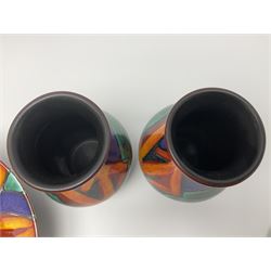 Four pieces of Poole Pottery in Graffiti pattern, comprising pair of vases of baluster form, dish and small plate, with impressed or printed marks beneath, vase H17cm