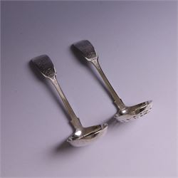 Pair of William IV silver Fiddle pattern spoons, comprising ladle and sifting spoon, each with presentation engravings to terminal, hallmarked William Rawlings Sobey, Exeter 1836