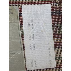 Late 20th century Louis De Poortere Belgian Shalamar wool ground rug, featuring a vibrant multi-coloured geometric design with stacked rectangular borders surrounding two central medallions, finished with fringed ends